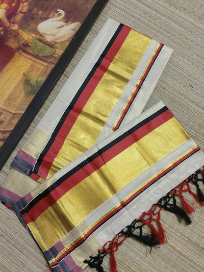 Tissue Set Mundu With Kasavu Kara And Tassels.