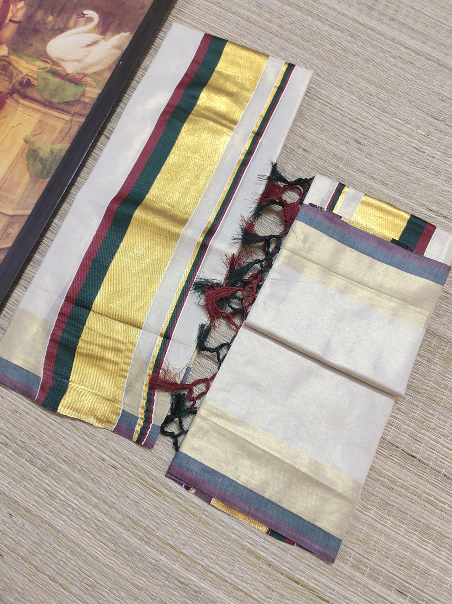 Tissue Set Mundu With Kasavu Kara And Tassels.