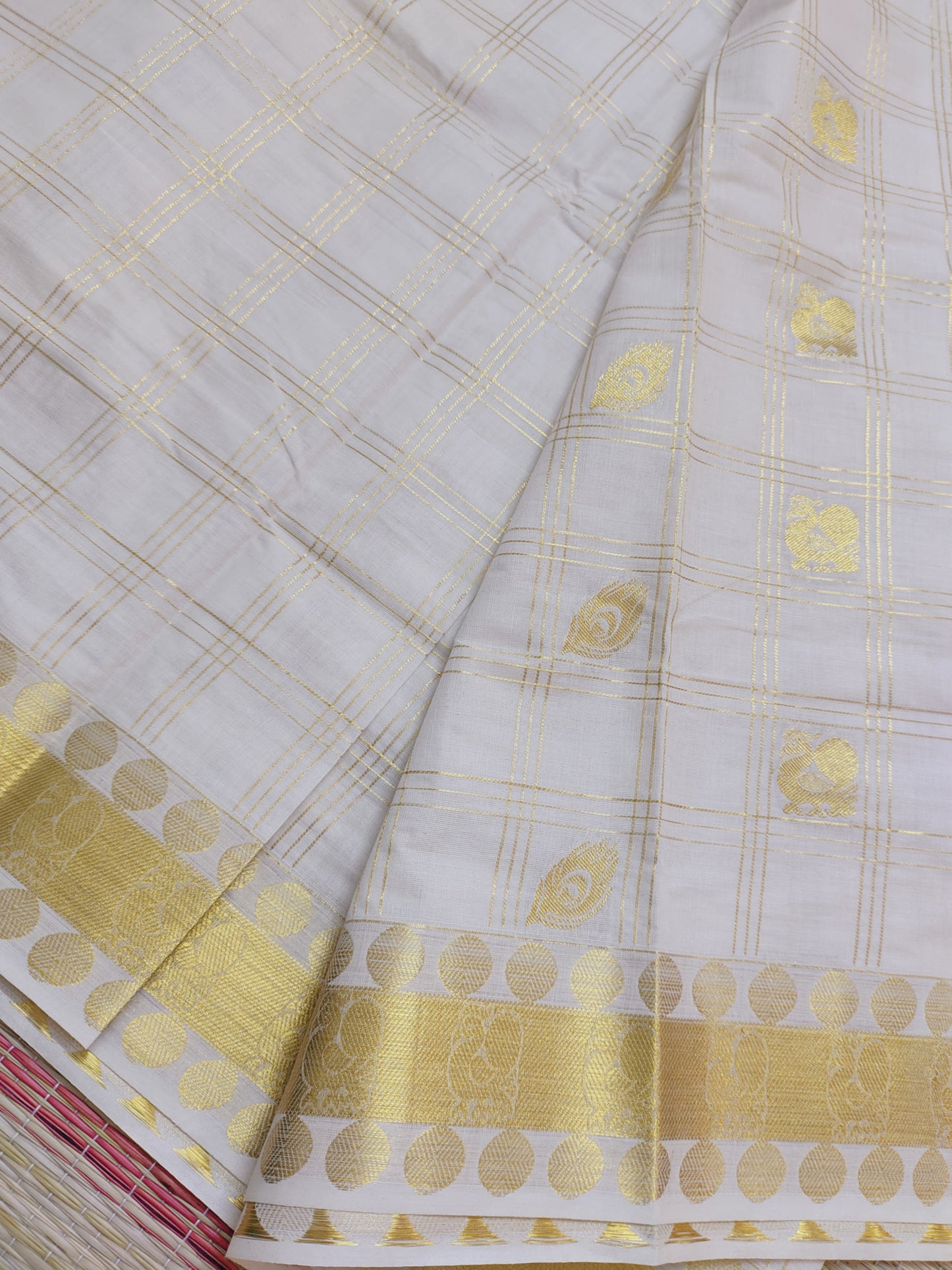 Kanjivaram Inspired Kasavu Cotton Saree With All-Over Checks And Motifs.