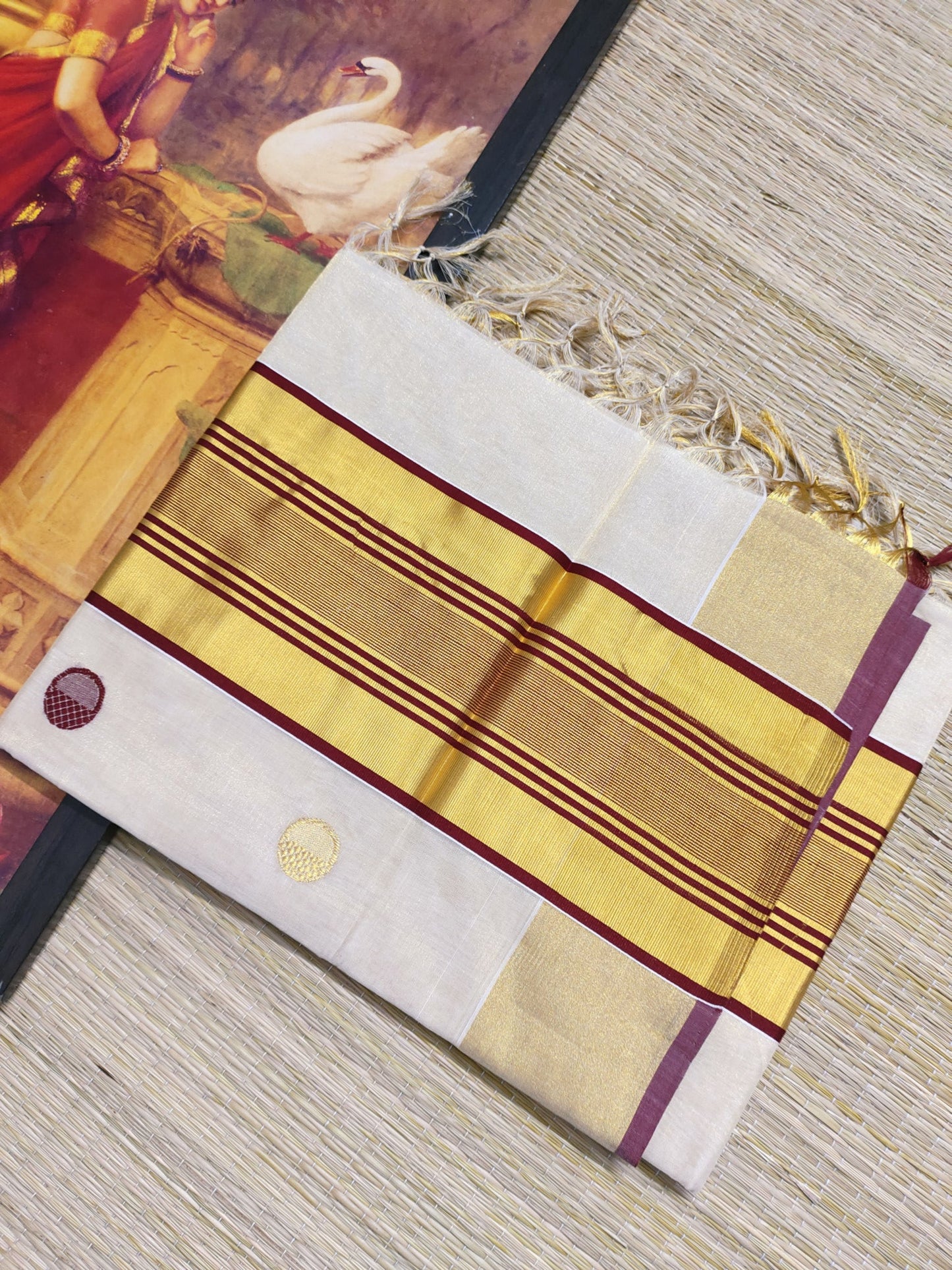 Premium Handloom Tissue Saree With All-Over Polka Weave.