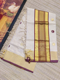 Premium Handloom Tissue Saree With All-Over Polka Weave.