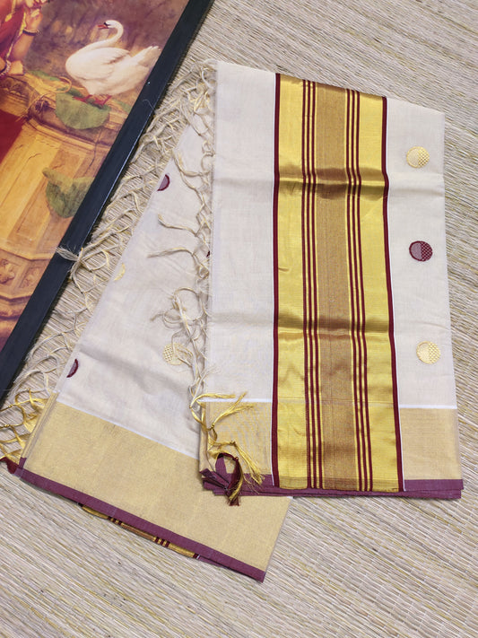 Premium Handloom Tissue Saree With All-Over Polka Weave.