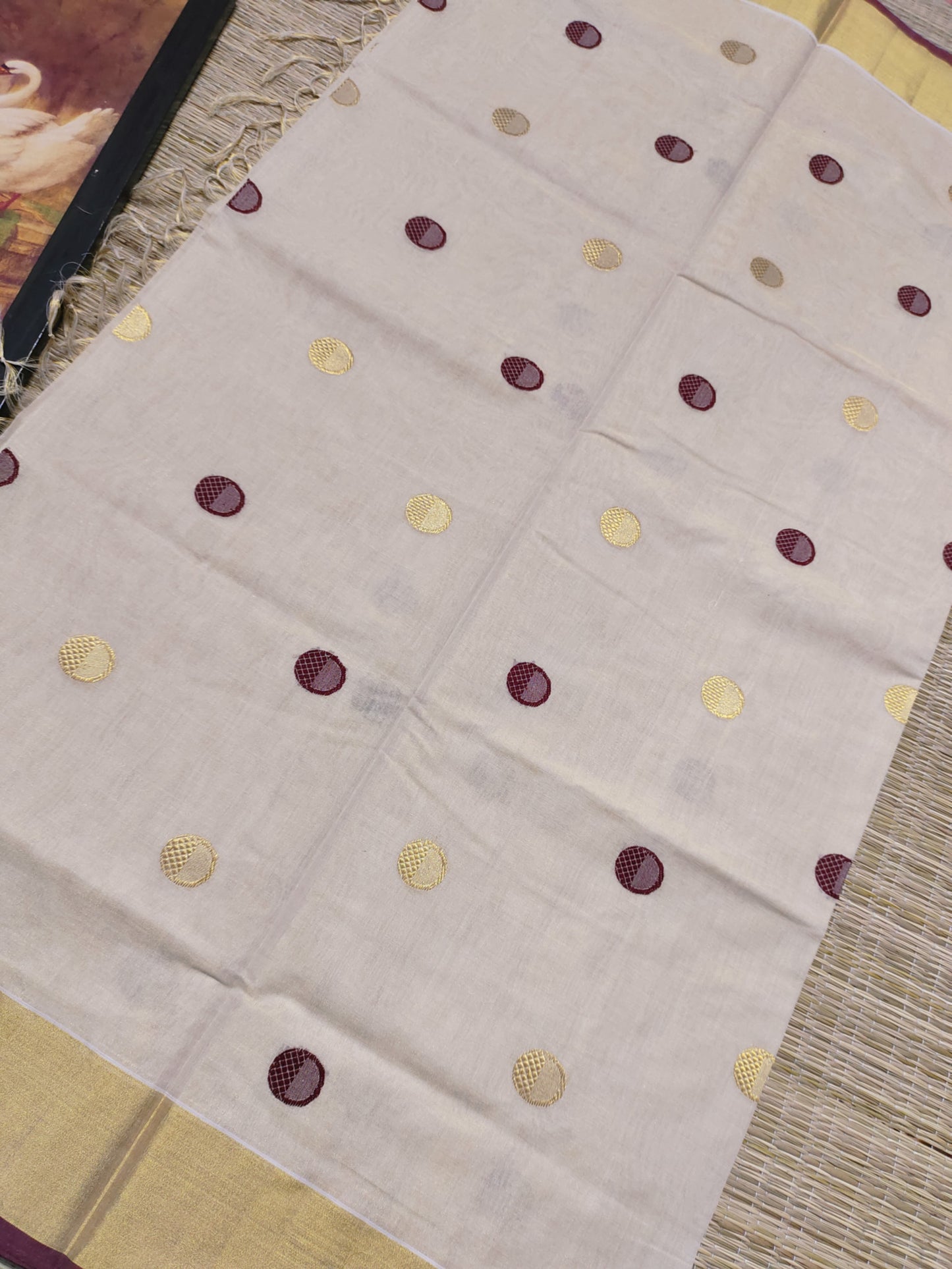 Premium Handloom Tissue Saree With All-Over Polka Weave.