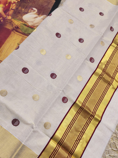 Premium Handloom Tissue Saree With All-Over Polka Weave.