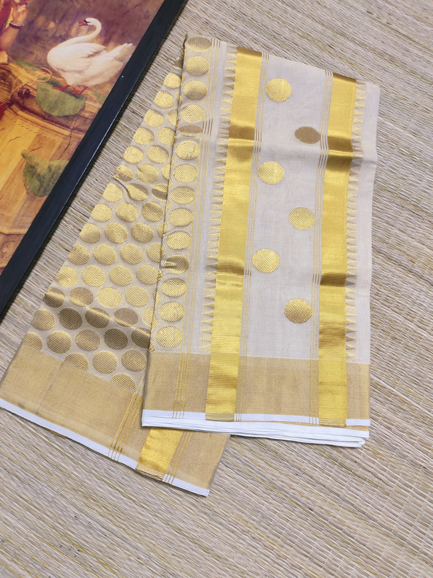 Kuthampully Handloom Tissue Saree With All-Over Polka Weave.