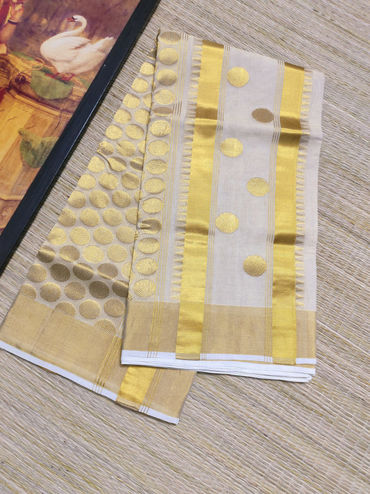 Kuthampully Handloom Tissue Saree With All-Over Polka Weave.