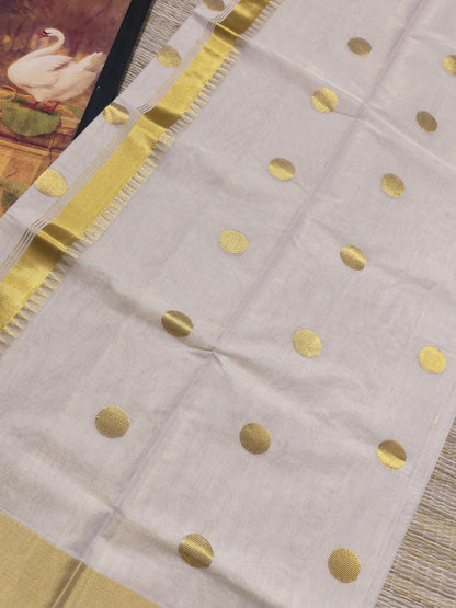 Kuthampully Handloom Tissue Saree With All-Over Polka Weave.