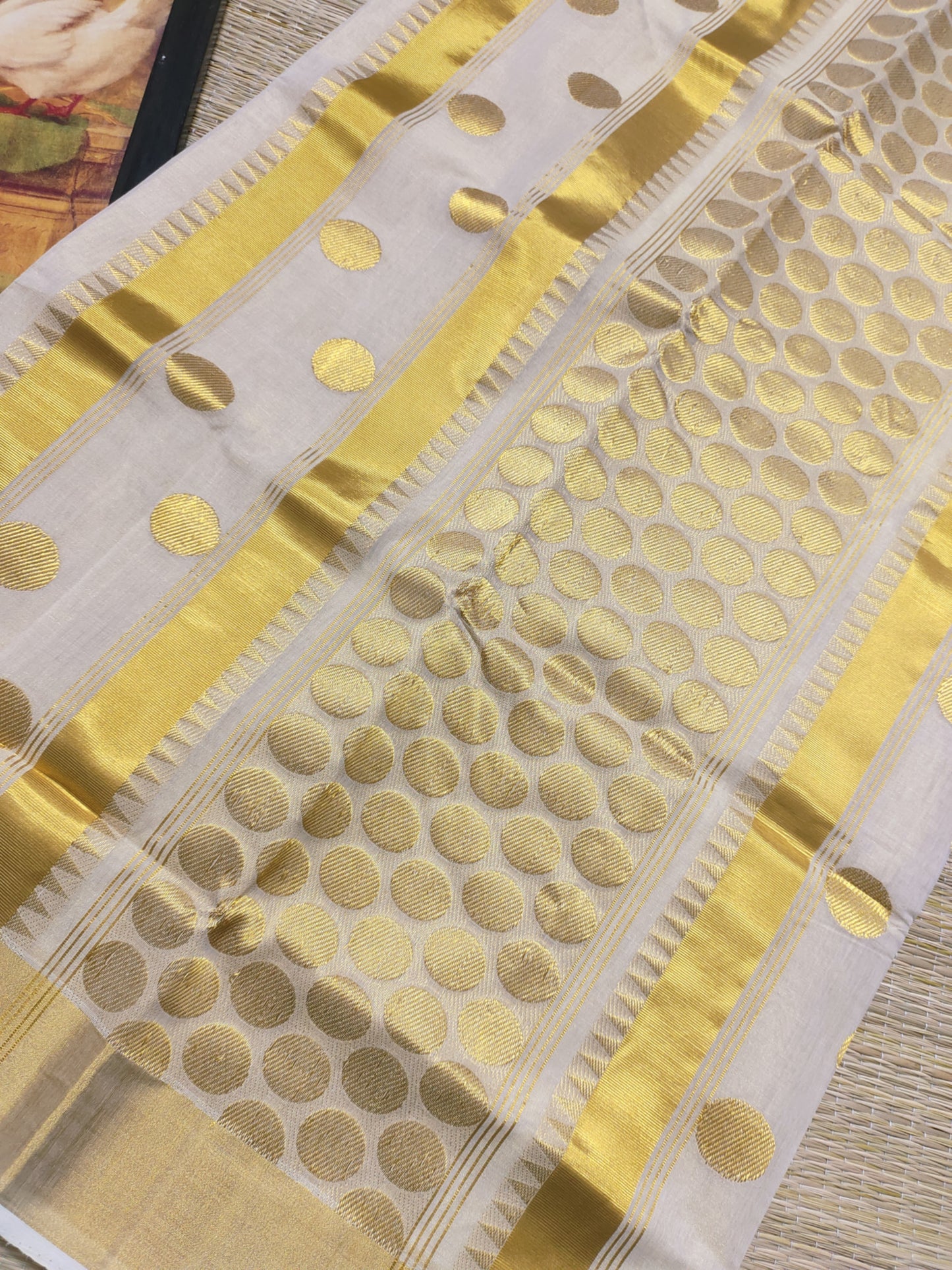 Kuthampully Handloom Tissue Saree With All-Over Polka Weave.
