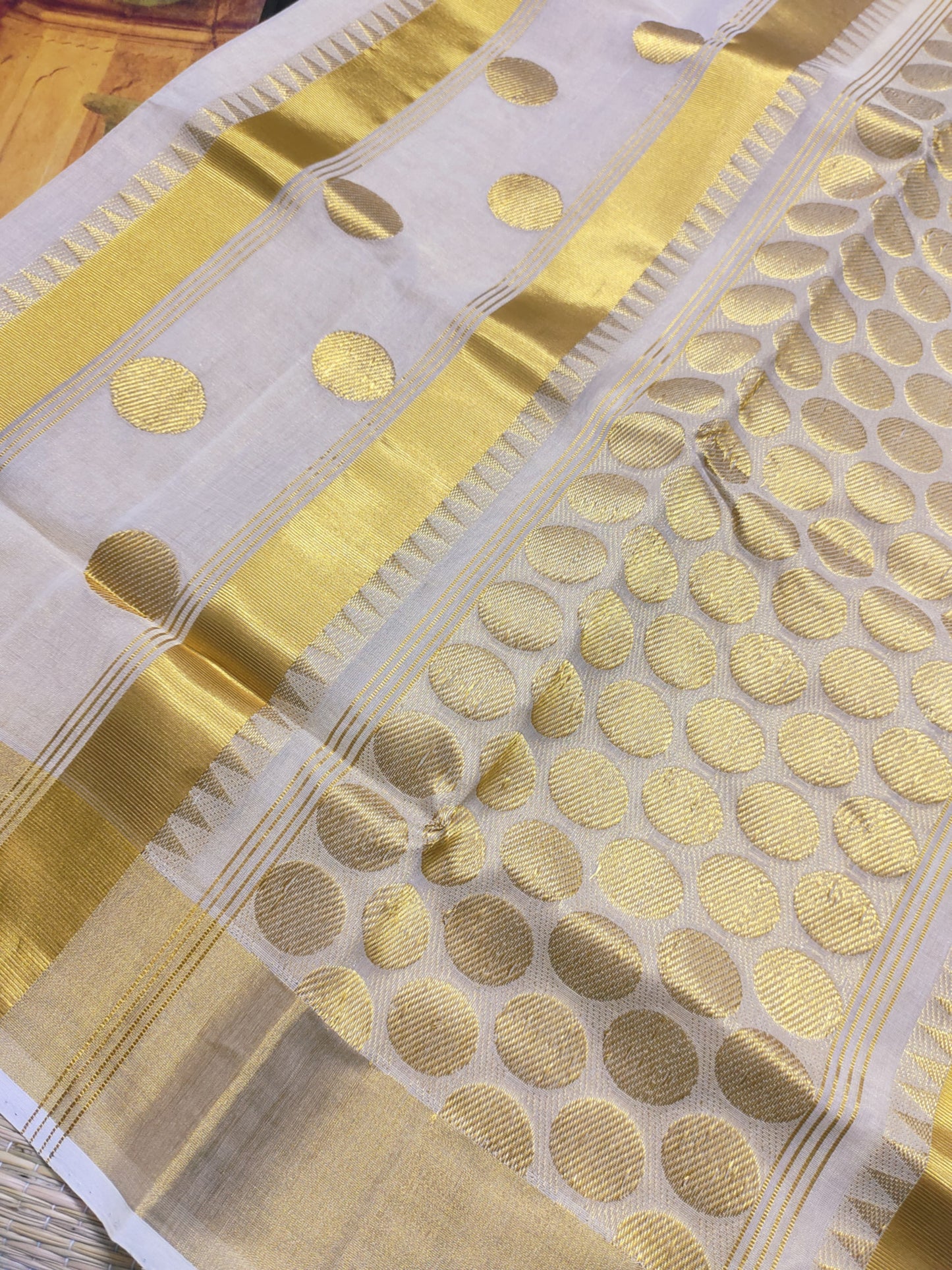 Kuthampully Handloom Tissue Saree With All-Over Polka Weave.