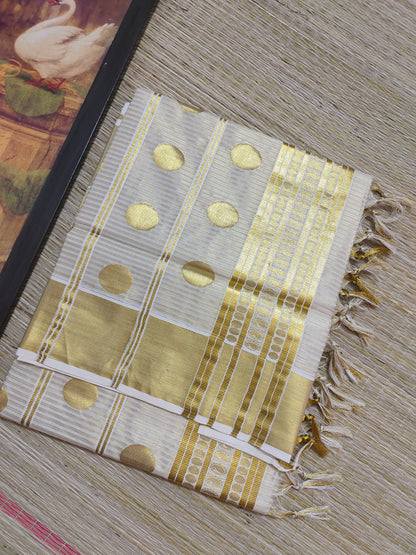 Premium Cotton Tissue Saree With All-Over Zari Lines, Polka Weave, And Brocade Blouse.
