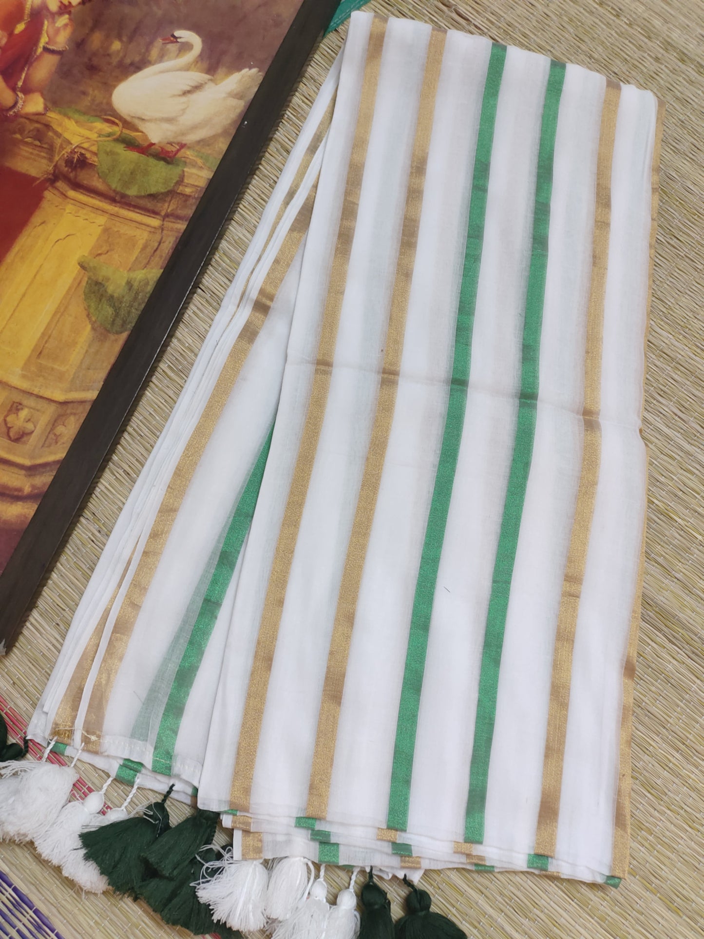 Premium Mul Cotton Saree With Zari Stripes  And Tassels.
