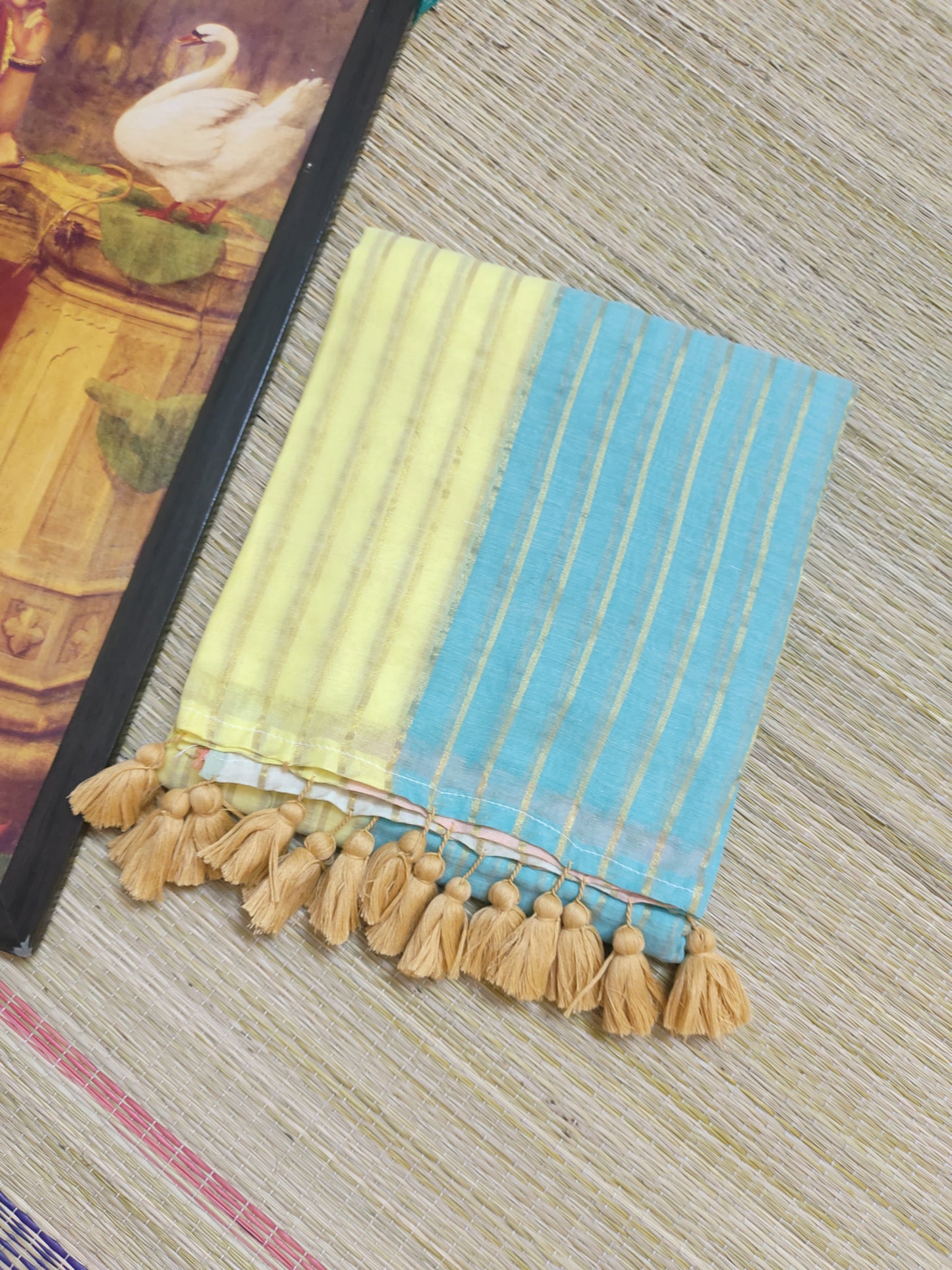 Premium Mul Cotton Saree With  all over Zari Stripes And Tassels.