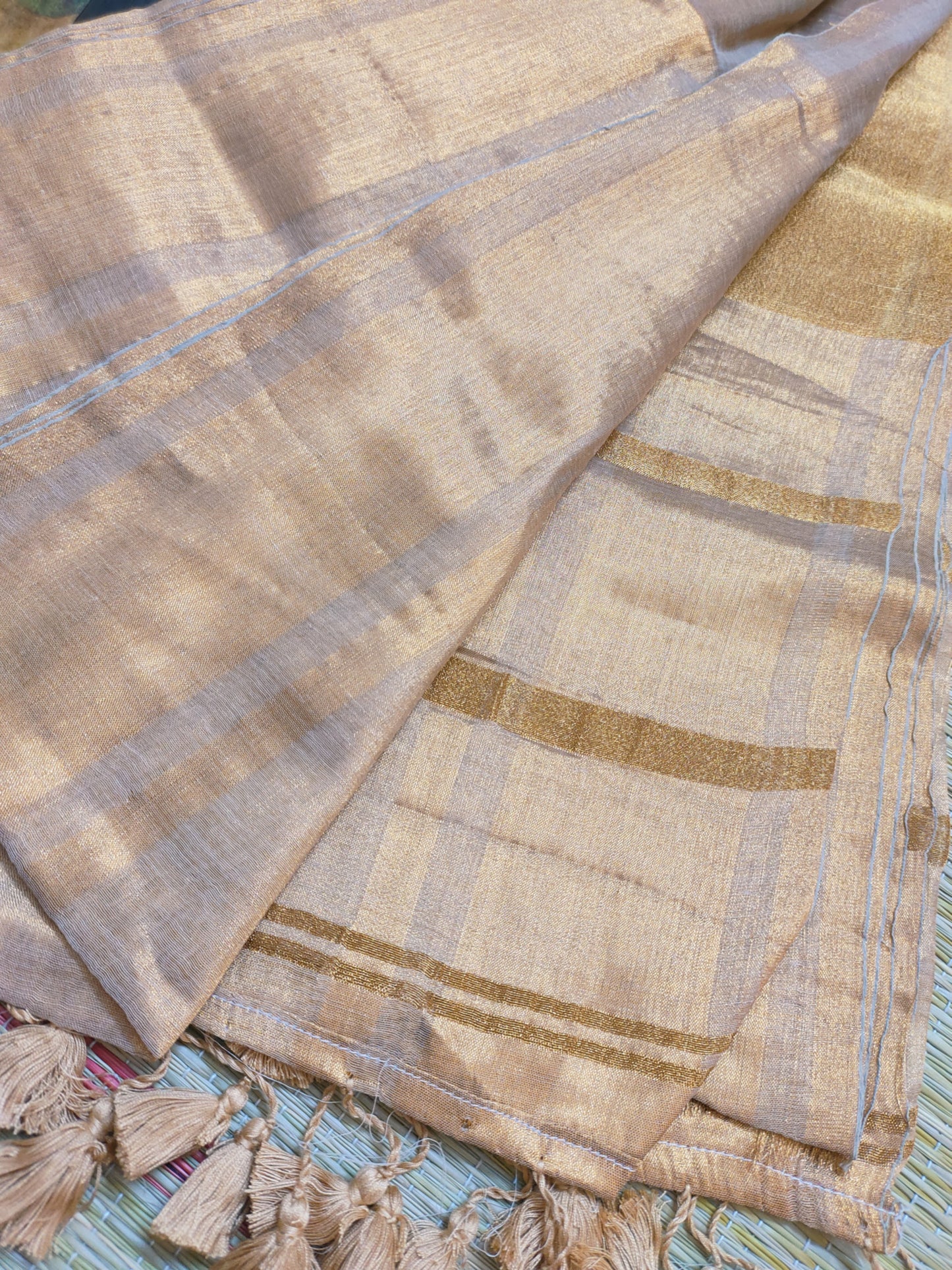 Premium Mul Mul Copper Tissue Saree With Tassels.