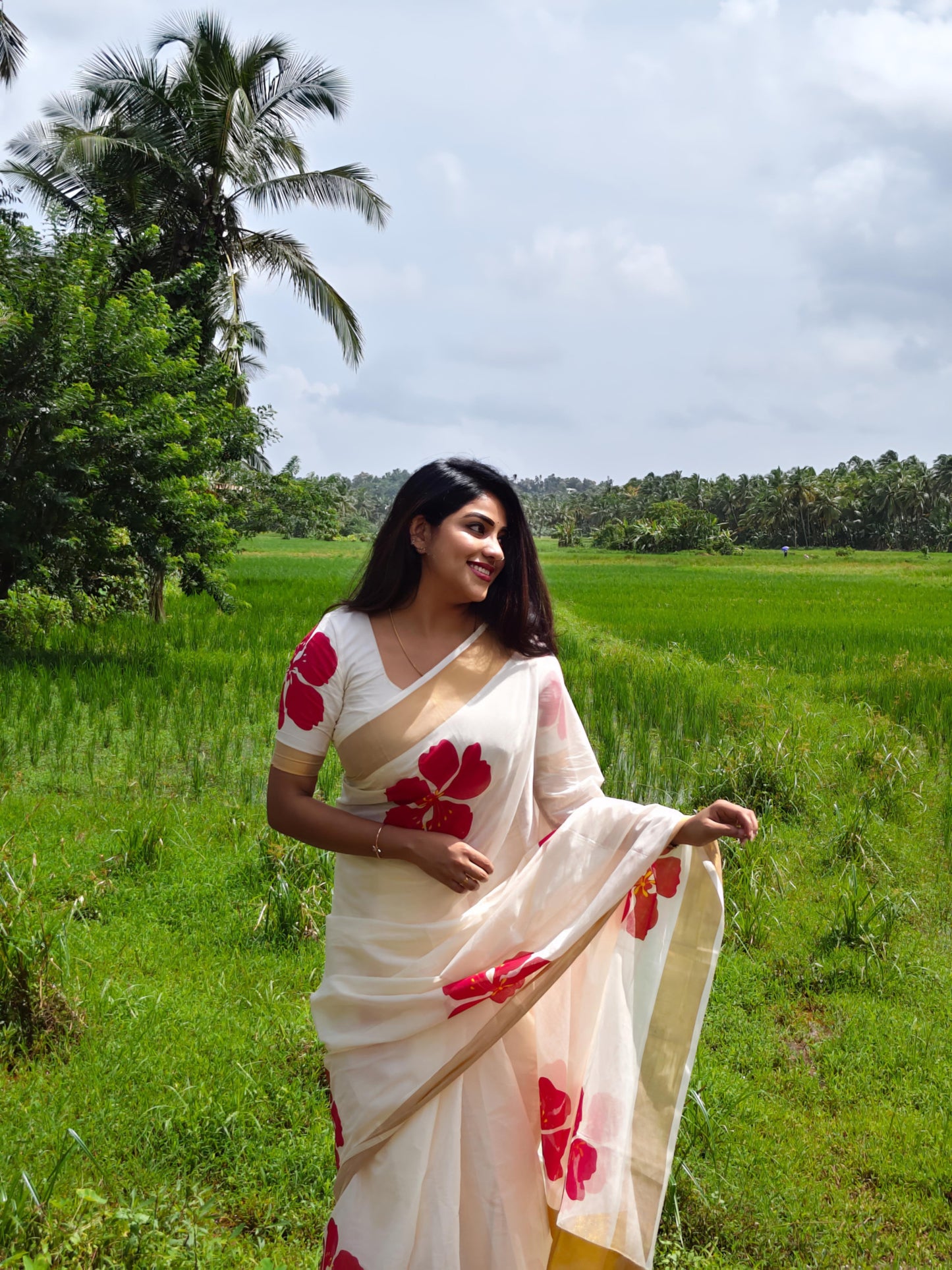 Premium Cotton Saree With Floral Print And Floral Printed Blouse.
