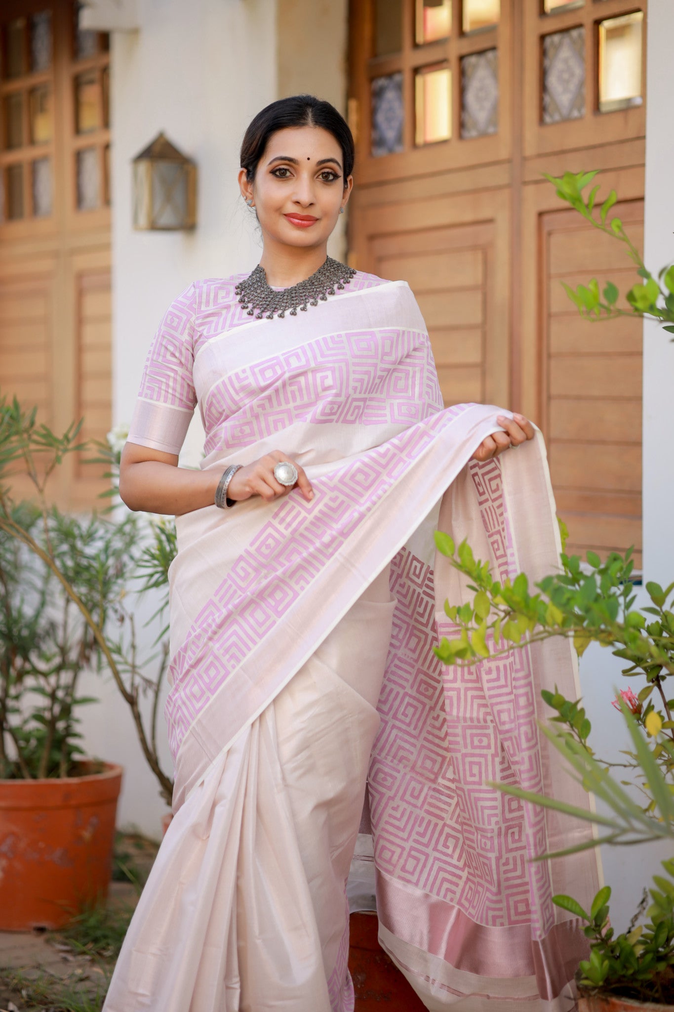 Rose gold tissue saree with hand block prints and fully printed blouse