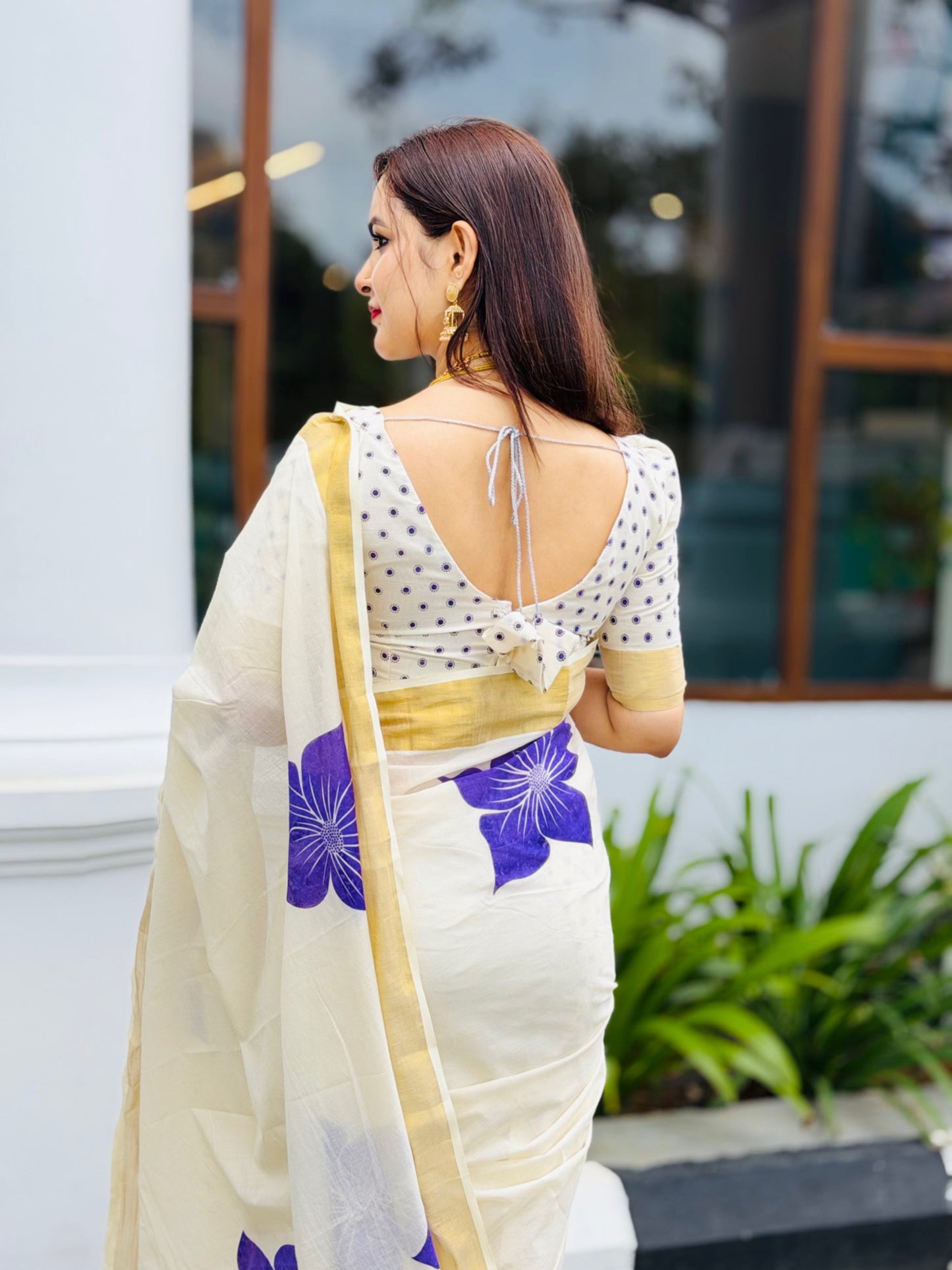 Premium cotton Kerala saree with trending floral prints and premium zari