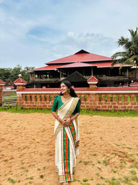 Traditional Kerala Kasavu And Kara Set Mundu With Premium Zari And Semi Silk Cotton Blouse.